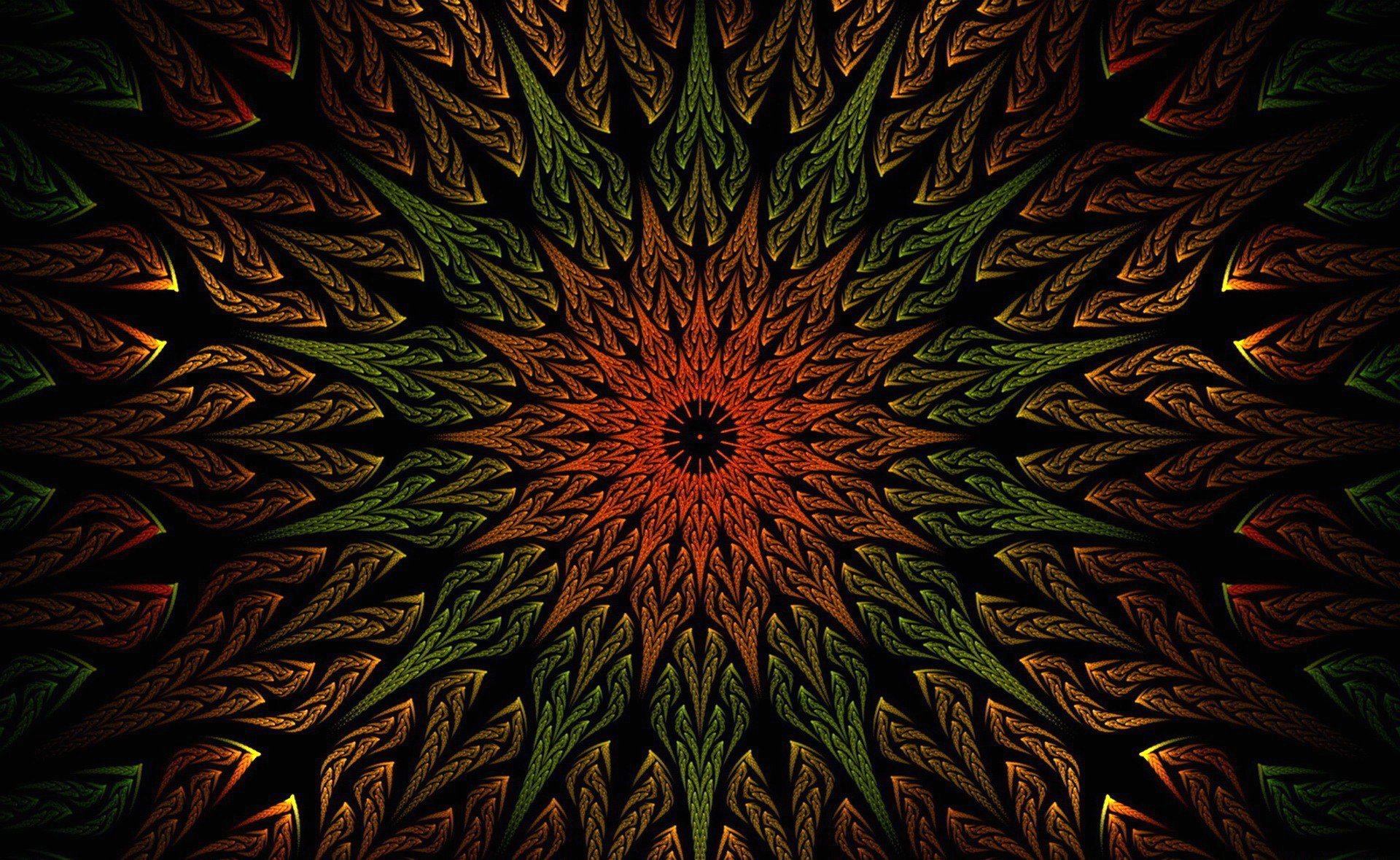 A vibrant, symmetrical abstract fractal pattern with rich colors radiating from the center, designed as a high-definition PC desktop wallpaper and background.