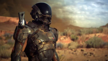 A HD PC wallpaper featuring a character in a sleek N7 armor from the video game Mass Effect: Andromeda, set against a rugged alien landscape.