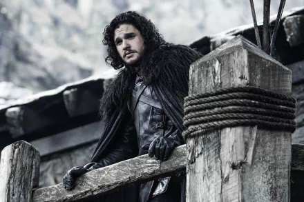 Jon Snow, portrayed by Kit Harington in Game of Thrones, stands on a wooden structure in this 4K Ultra HD PC desktop wallpaper.