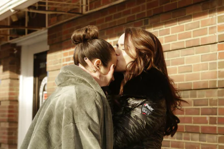 HD desktop wallpaper featuring Dominique Provost-Chalkley and Melanie Scrofano as Waverly Earp from the TV show Wynonna Earp sharing a tender moment.