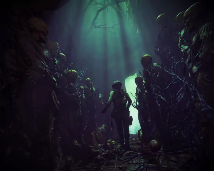 4K Ultra HD desktop wallpaper from the video game Rise of the Tomb Raider, depicting a figure standing amidst ancient skeletal statues in a dark, eerie cavern.