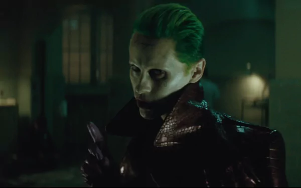 HD desktop wallpaper featuring Jared Leto as the Joker from the movie Suicide Squad. The image showcases a dark, ominous scene with the Joker's green hair and iconic look.