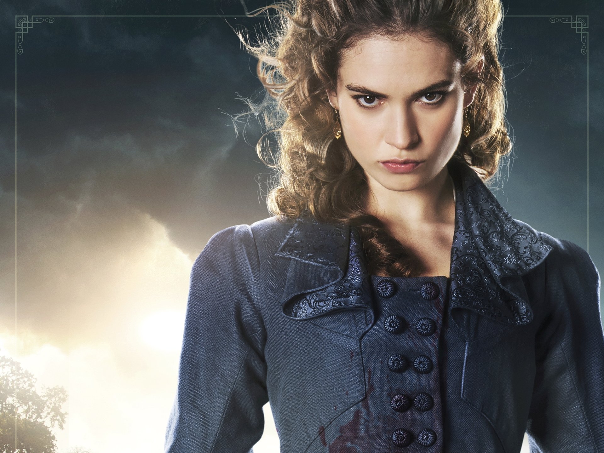HD PC desktop wallpaper: close-up of a stern young woman in period costume with an intense gaze against a moody sky, from the movie Pride and Prejudice and Zombies.