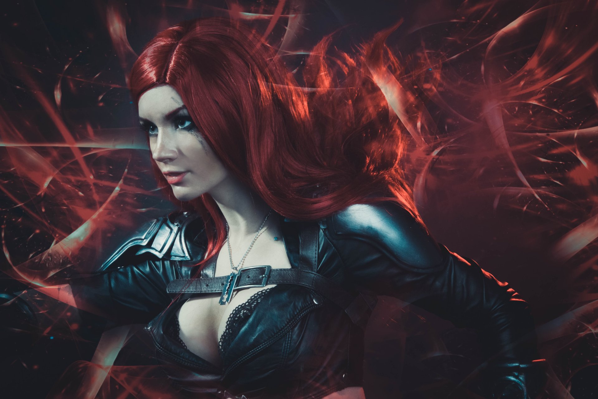 A woman cosplays as Katarina from League of Legends, featuring striking red hair and a dark outfit, set against a dynamic background in this HD desktop wallpaper.