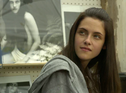 HD desktop wallpaper featuring Kristen Stewart from the movie The Cake Eaters, showing her with a contemplative expression and casual attire.