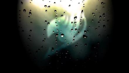 HD desktop wallpaper featuring a blurred image of an Anime character from Fairy Tail, obscured by water droplets on glass. The background has a soft, diffused light effect.