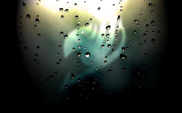 HD desktop wallpaper featuring a blurred image of an Anime character from Fairy Tail, obscured by water droplets on glass. The background has a soft, diffused light effect.