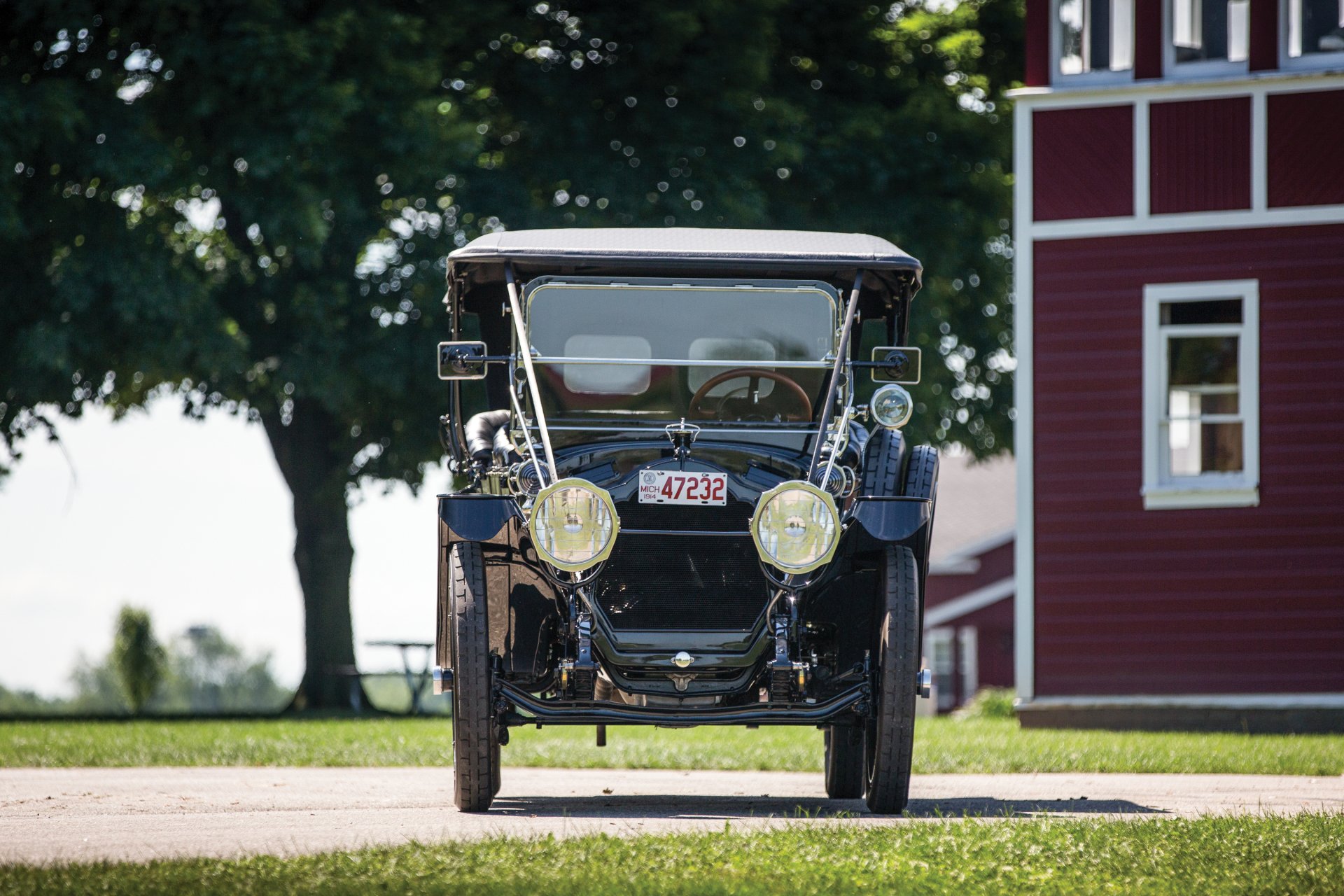 Front view of a vintage 1914 Packard Six 5-passenger Touring car parked on a sunny day, showcased as an HD PC desktop wallpaper and background.