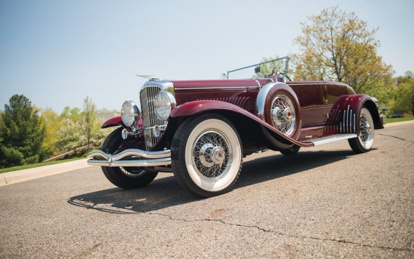 Vehicles Duesenberg Model J Disappearing Top Duesenberg 1929 Duesenberg Model J Disappearing Top Convertible Coupe Vintage Car HD Wallpaper | Background Image