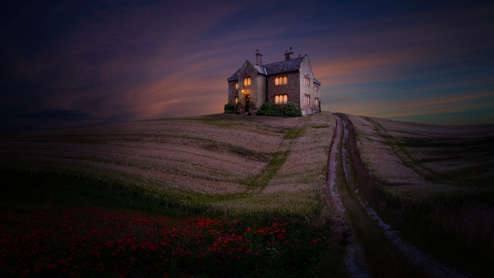 A serene HD desktop wallpaper showing a church on a hill at dusk, with soft twilight light casting a calm atmosphere over the landscape.