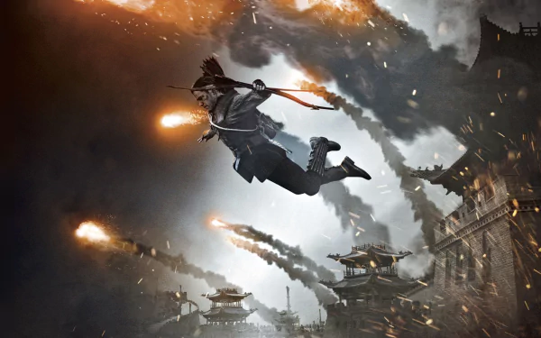 A dynamic scene from the movie The Great Wall, featuring a character in mid-air with arrows, surrounded by explosions and ancient architecture, perfect as a HD desktop wallpaper.