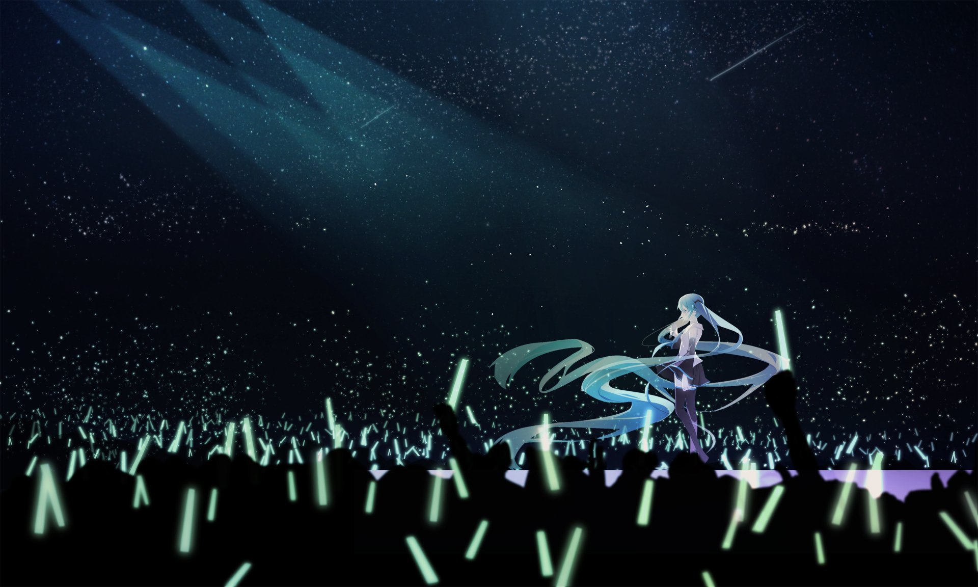 HD anime desktop wallpaper featuring Hatsune Miku performing on stage with glowing light sticks in the audience, capturing a vibrant Vocaloid concert atmosphere.
