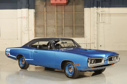 Blue Dodge Dodge Coronet Super Bee hardtop coupe vehicle in a garage, shown as a 2K Quad HD PC desktop wallpaper and background.