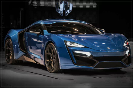 HD desktop wallpaper of a sleek blue Lykan HyperSport vehicle showcased in a dimly lit setting.