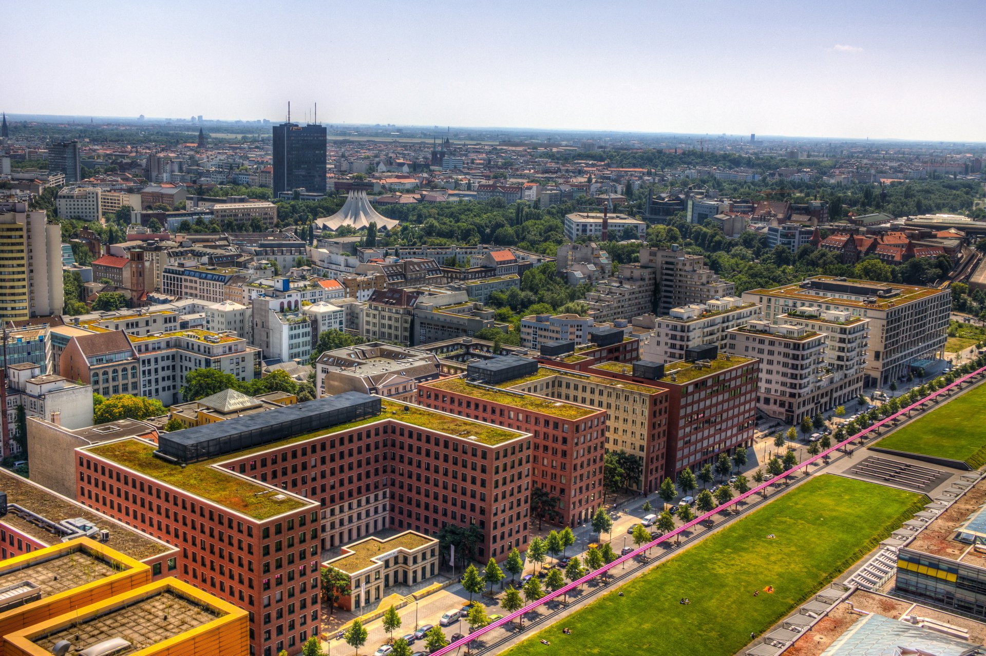 4K Ultra HD PC desktop wallpaper and background: aerial view of man-made Berlin cityscape, Germany — colorful modern buildings, parks and skyline stretching to the horizon.