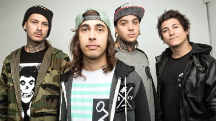 HD wallpaper of the band Pierce the Veil posing together for a desktop background.
