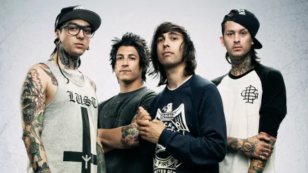 HD desktop wallpaper featuring the band Pierce the Veil posing together against a neutral background.