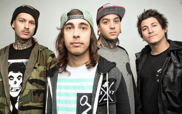HD wallpaper of the band Pierce the Veil posing together for a desktop background.