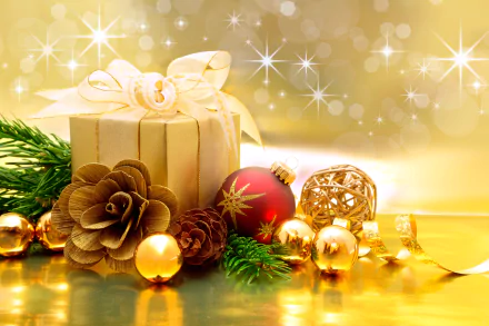 4K Ultra HD holiday desktop wallpaper featuring a glittering gold gift box, pine cones, red Christmas ornaments, and festive greenery against a sparkling golden background.