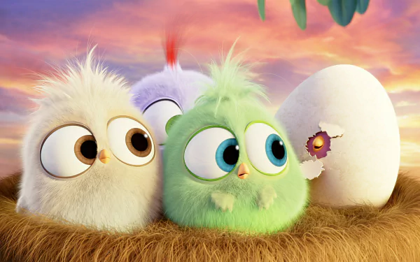 HD wallpaper featuring characters from The Angry Birds Movie, depicts three fluffy birds and a hatching egg, set against a vibrant sky.