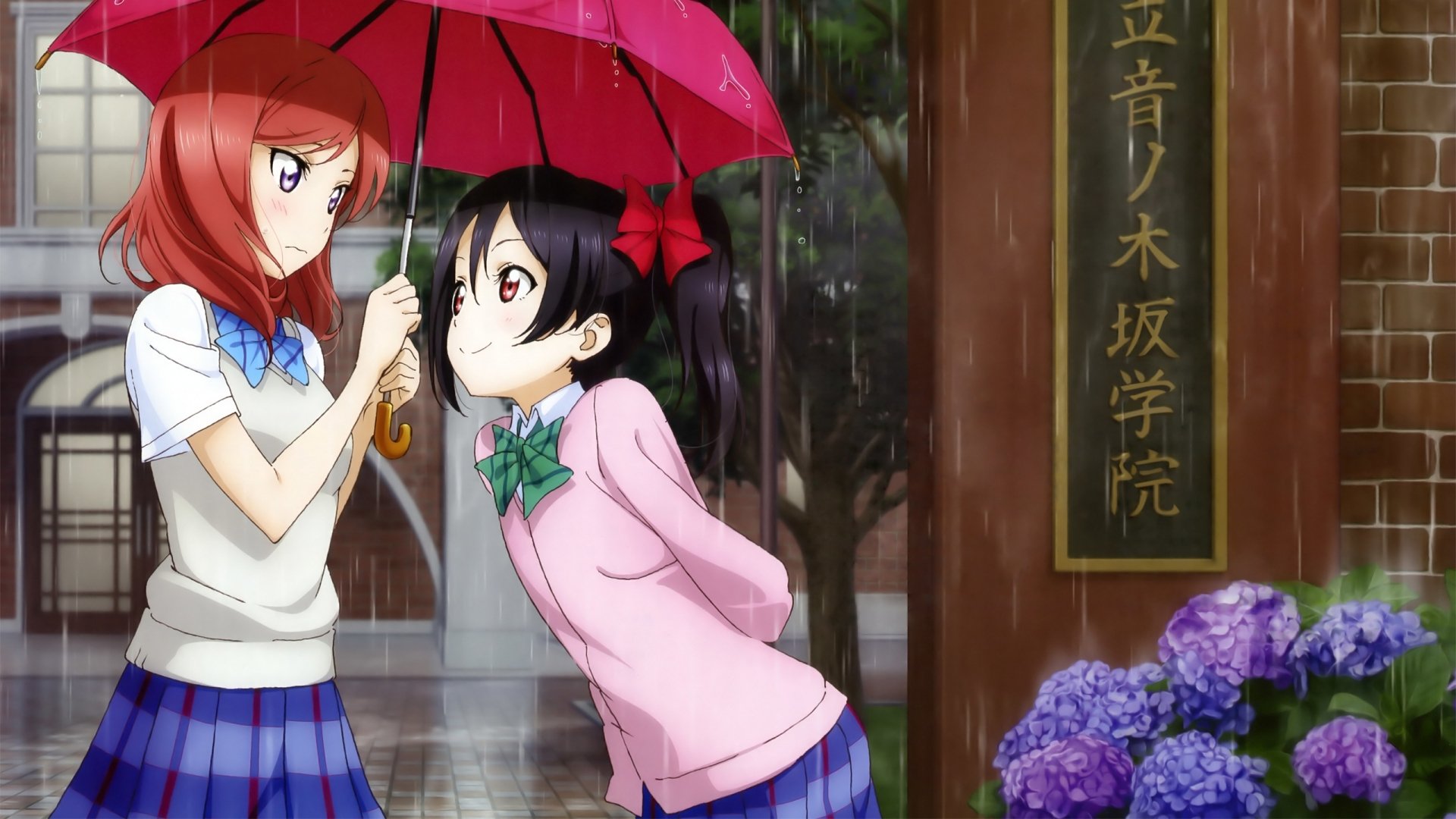 Anime characters Maki Nishikino and Nico Yazawa from Love Live! share an umbrella in the rain, creating a charming HD desktop wallpaper.