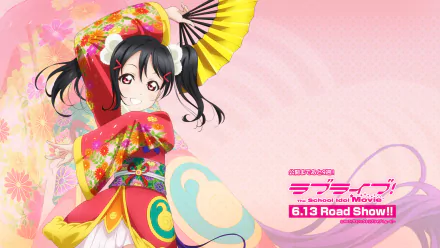 HD desktop wallpaper featuring Nico Yazawa from the anime Love Live!, showcasing her in a vibrant outfit with a fan and colorful background.
