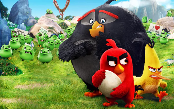 A HD desktop wallpaper and background featuring characters from The Angry Birds Movie, with Red, Bomb, and Chuck in the forefront and green pigs in the background holding signs.