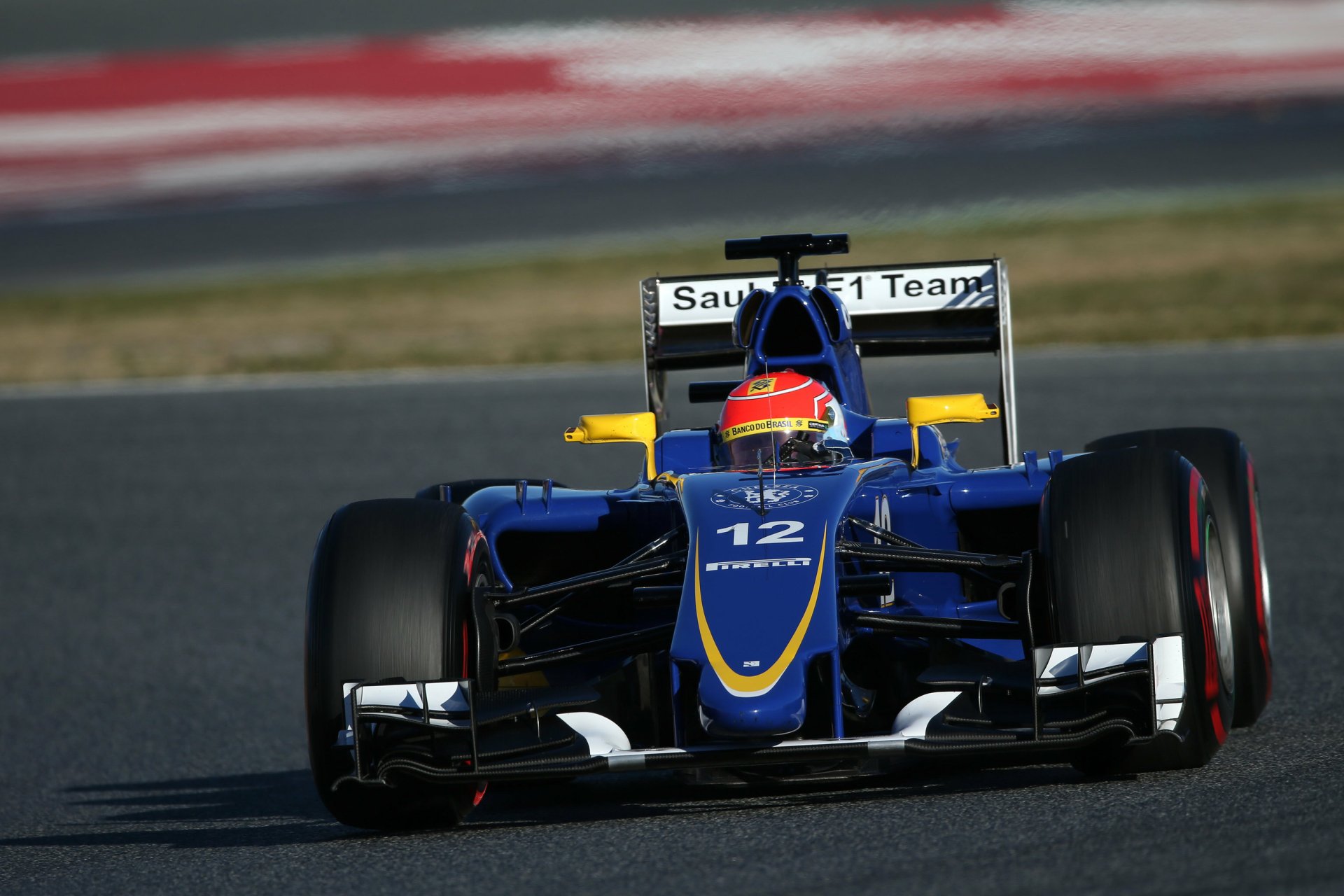 Sauber C34 F1 race car on track, blue and yellow Formula 1 vehicle — 2K Quad HD PC desktop wallpaper/background.