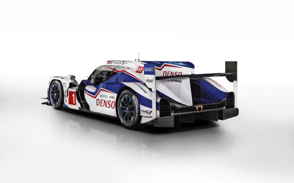Rear three-quarter view of Toyota TS040 Hybrid Le Mans race car in white, blue and red livery on a clean white backdrop — 4K Ultra HD PC desktop wallpaper