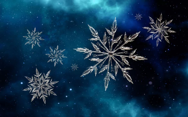 4K Ultra HD desktop wallpaper featuring artistic blue ice snowflakes floating against a deep blue cosmic background.