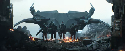 Futuristic soldiers armed and armored stand in front of a large sci-fi vehicle amid a war-torn landscape, depicted in a high-definition PC desktop wallpaper.