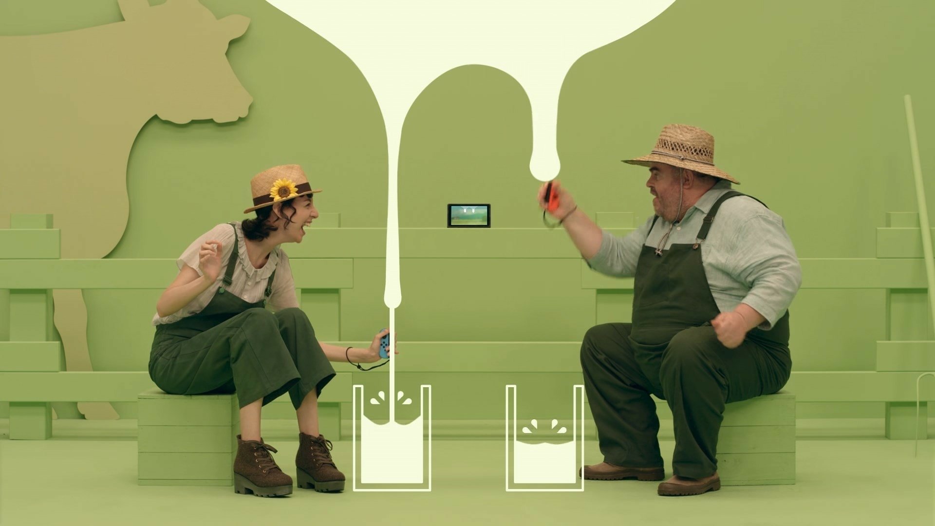 HD desktop wallpaper featuring two players engaged in a 1-2-Switch game, surrounded by a playful green backdrop.