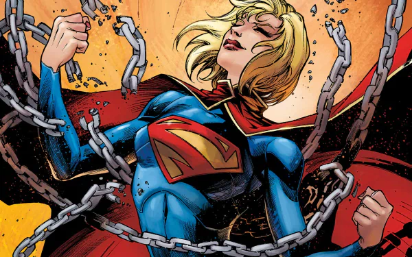HD comic-style PC desktop wallpaper featuring Supergirl breaking free from chains with a powerful and triumphant expression.