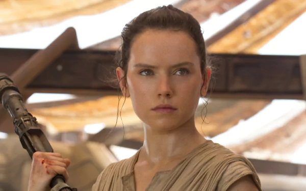 Daisy Ridley as Rey from Star Wars Episode VII: The Force Awakens in a 4K Ultra HD PC desktop wallpaper and background.