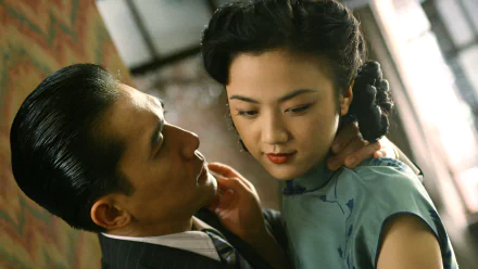 HD PC desktop wallpaper featuring an intimate scene from the movie Lust, Caution, capturing the intense and delicate moment between the two main characters.