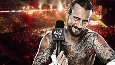 HD PC desktop wallpaper of a heavily tattooed man holding a WWE-branded microphone in front of a packed arena, with a TV show WWE Raw backdrop.