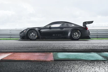 Side profile of a black Lexus RC F GT3 race car (Lexus RC) on a wet racetrack, high-detail 2K Quad HD PC desktop wallpaper background.