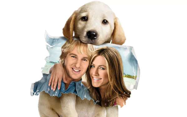 HD desktop wallpaper: Labrador retriever puppy with two smiling actors embraced in a poster-style collage referencing the movie Marley & Me.