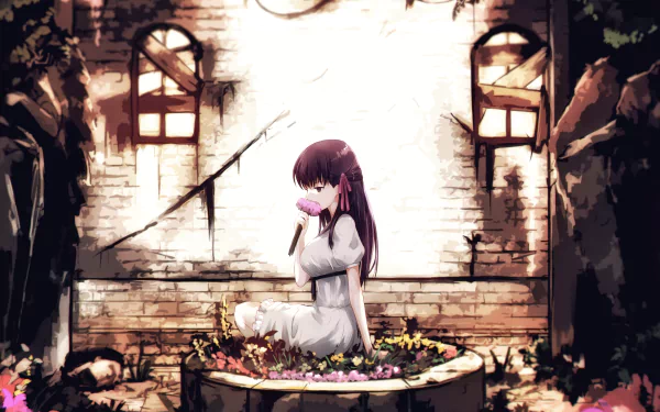 HD desktop wallpaper featuring Sakura Matou from the anime Fate/stay Night Movie: Heaven's Feel, sitting gracefully in a flower circle amid a picturesque, broken-down setting.