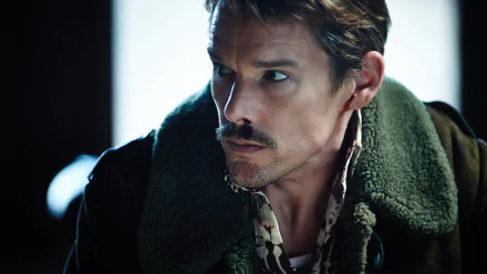 HD desktop wallpaper featuring Ethan Hawke in a dramatic scene from the movie Predestination, showcasing intense expression and detailed costume.