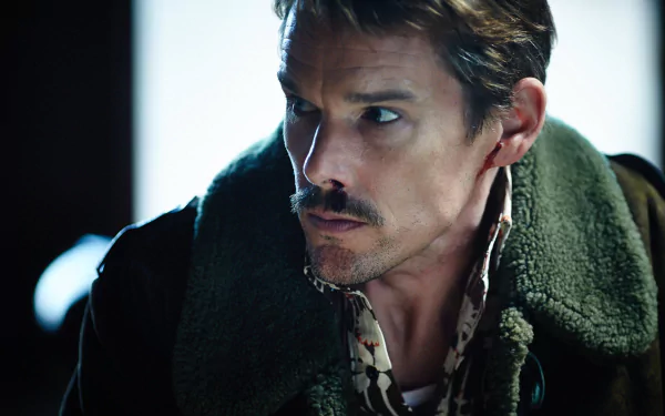 HD desktop wallpaper featuring Ethan Hawke in a dramatic scene from the movie Predestination, showcasing intense expression and detailed costume.