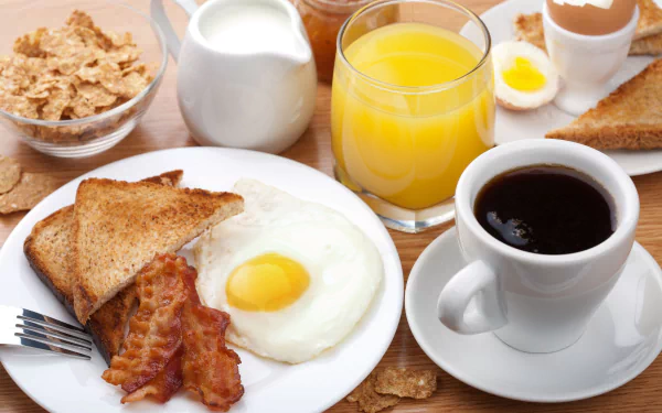 HD PC desktop wallpaper and background showing a breakfast spread: cereal, toast, fried egg, bacon, glass of orange juice, cup of coffee.