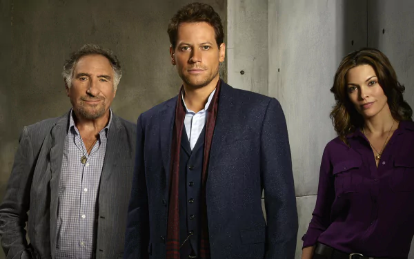 Three characters from the TV show Forever stand against a concrete wall, framed for an HD PC desktop wallpaper and background.