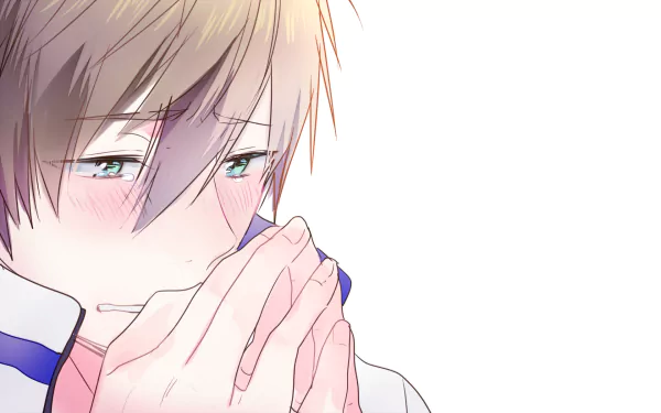 HD anime desktop wallpaper featuring Makoto Tachibana from Free!, showing a close-up of him with a soft expression and hands near his face.