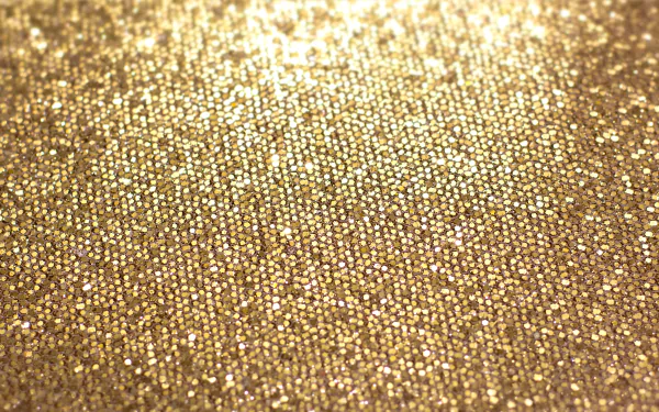 Abstract golden texture pattern, shimmering metallic bokeh close-up — 5K Ultra HD PC desktop wallpaper and background.