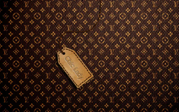 HD desktop wallpaper featuring a classic Louis Vuitton pattern with a branded tag.