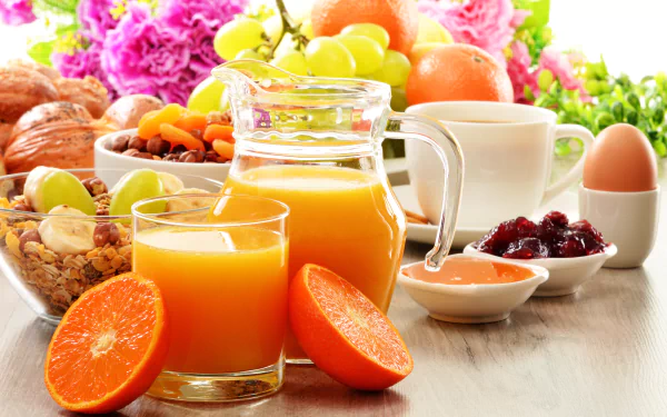 A vibrant 4K Ultra HD breakfast scene featuring muesli, fresh fruit, orange juice, jam, a boiled egg, and a cup of coffee, accented by colorful flowers.