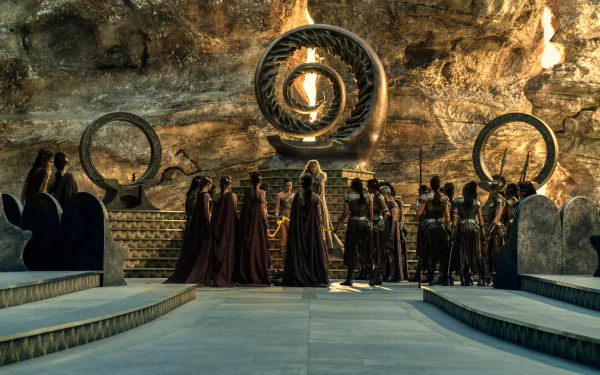HD desktop wallpaper featuring a scene from the movie Wonder Woman with Diana of Themyscira (Gal Gadot) and General Antiope (Robin Wright) in an elaborate setting with stunning background decor.