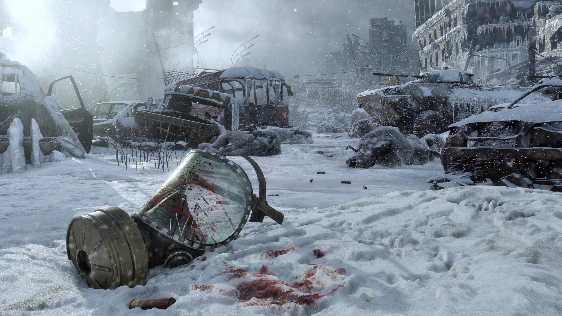 HD desktop wallpaper of Metro Exodus with a snow-covered, post-apocalyptic landscape featuring a gas mask and blood stains in the foreground amid dilapidated vehicles and ruins.