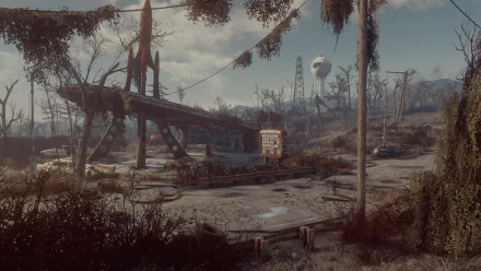 HD desktop wallpaper from Fallout 4, depicting a post-apocalyptic landscape with a desolate rocket fuel station, overgrown vegetation, and a damaged road under a cloudy sky.